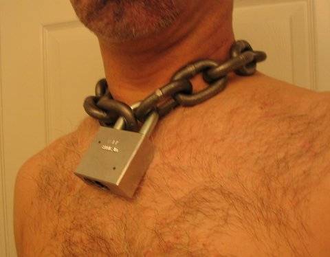 heavy chain padlocked around neck