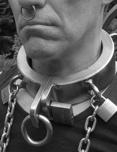 men with chains and collars locked on 10