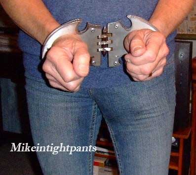 mike_wearing_batcuffs